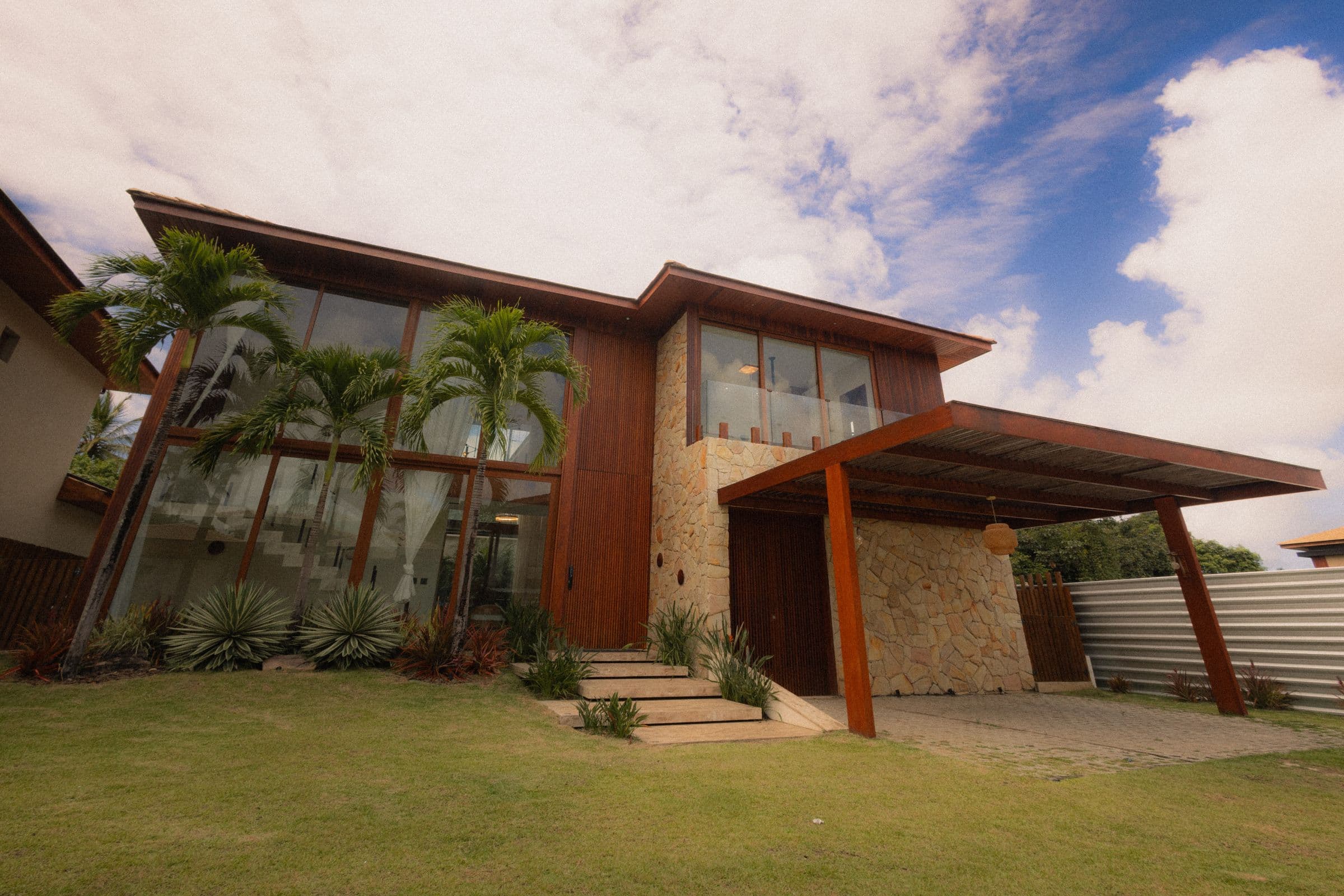 Modern tropical residence with deep eaves in bright daylight